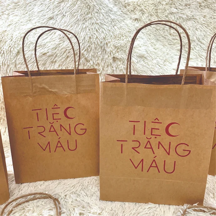 Túi giấy kraft nâu quai xoắn đựng quà in logo theo yêu cầu