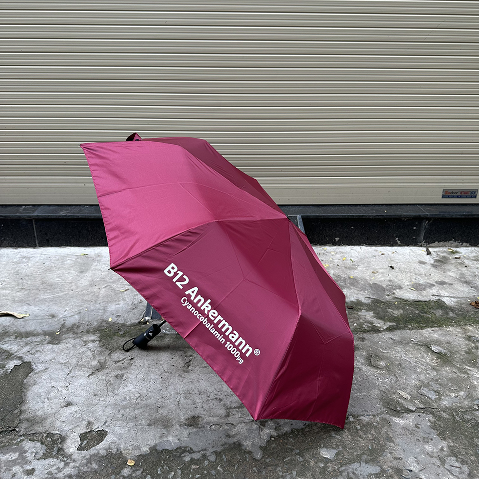 Ô Dù In Logo B12 Ankermann – Dù Gấp Quảng Cáo Màu Đỏ Đô